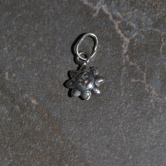 Sterling silver double sided sun charm - Picture 1 of 3